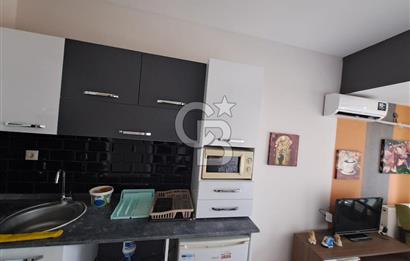 Seyrek'te Havuzlu ve Yeşillikli Site Eşyalı Kiralık 1+1