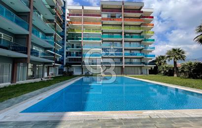 Bornova Park Evlerinde Havuz Cepheli Büyük Tip 1+1 Satılık Daire