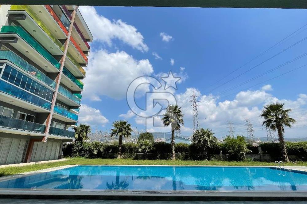 Bornova Park Evlerinde Havuz Cepheli Büyük Tip 1+1 Satılık Daire