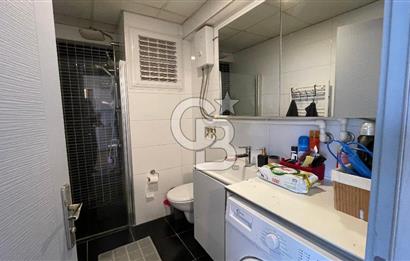 Bornova Park Evlerinde Havuz Cepheli Büyük Tip 1+1 Satılık Daire