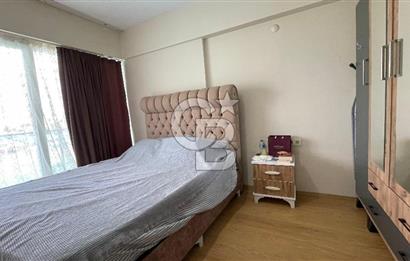 Bornova Park Evlerinde Havuz Cepheli Büyük Tip 1+1 Satılık Daire