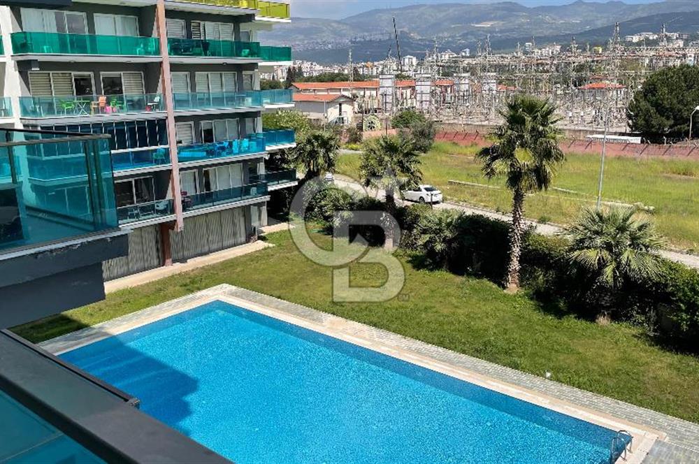 Bornova Park Evlerinde Havuz Cepheli Büyük Tip 1+1 Satılık Daire