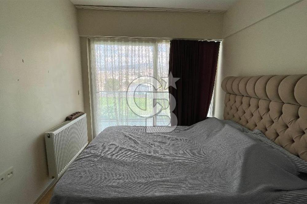 Bornova Park Evlerinde Havuz Cepheli Büyük Tip 1+1 Satılık Daire