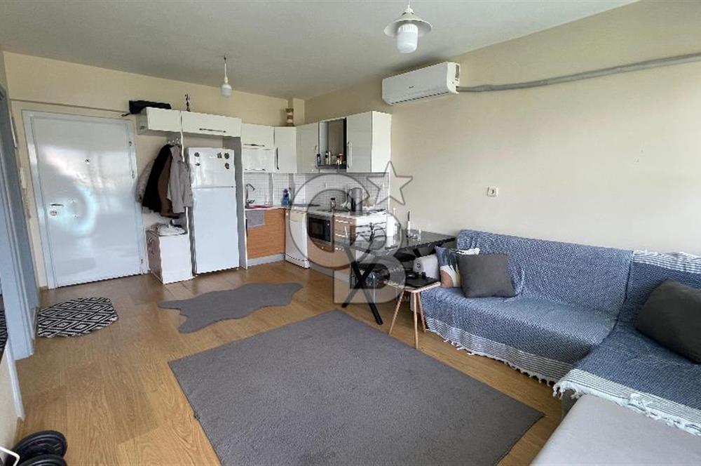 Bornova Park Evlerinde Havuz Cepheli Büyük Tip 1+1 Satılık Daire