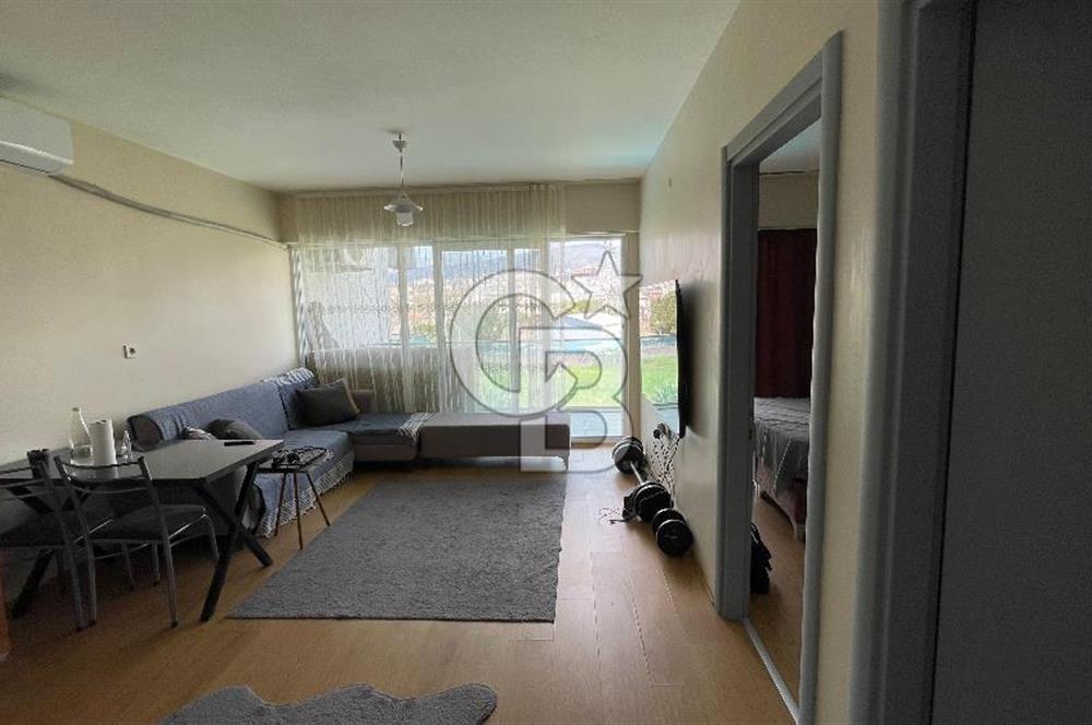 Bornova Park Evlerinde Havuz Cepheli Büyük Tip 1+1 Satılık Daire