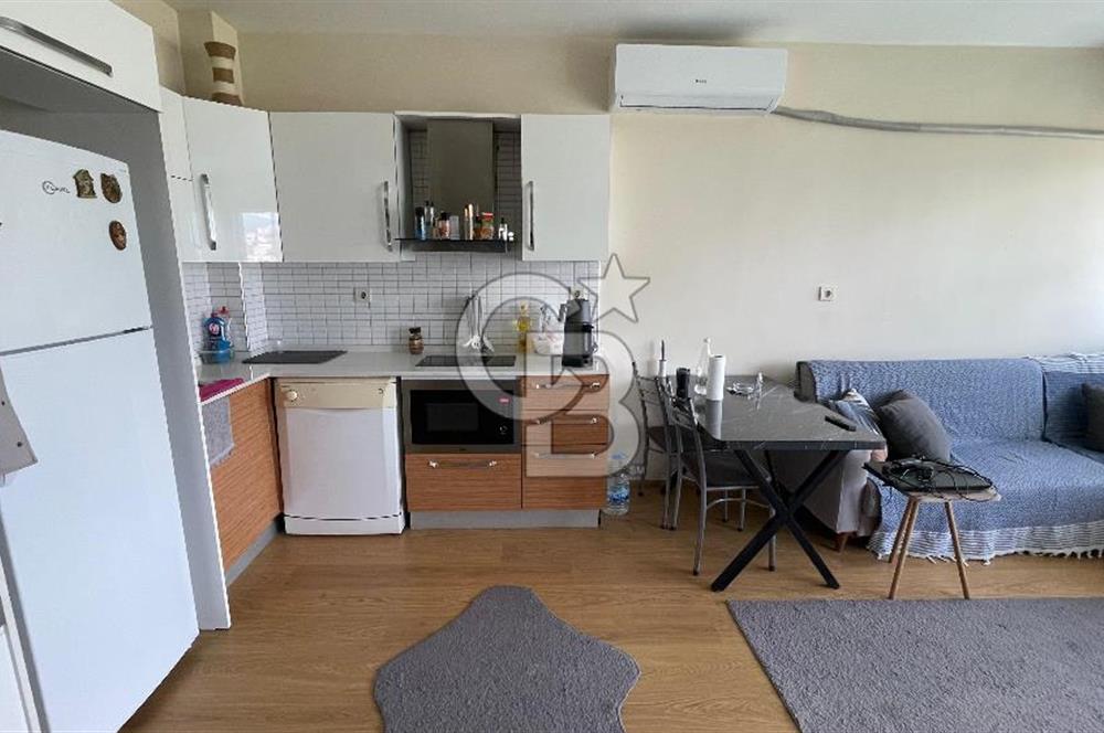 Bornova Park Evlerinde Havuz Cepheli Büyük Tip 1+1 Satılık Daire