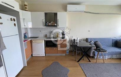 Bornova Park Evlerinde Havuz Cepheli Büyük Tip 1+1 Satılık Daire