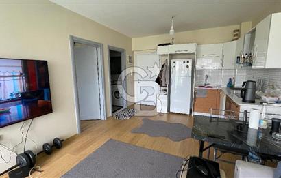 Bornova Park Evlerinde Havuz Cepheli Büyük Tip 1+1 Satılık Daire