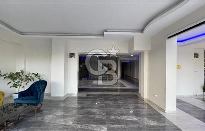 Bornova Park Evlerinde Havuz Cepheli Büyük Tip 1+1 Satılık Daire