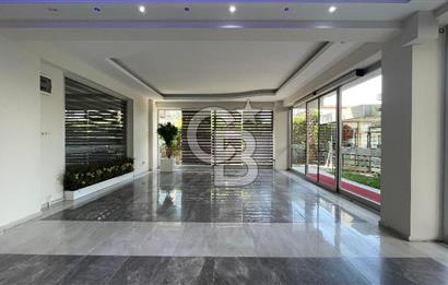 Bornova Park Evlerinde Havuz Cepheli Büyük Tip 1+1 Satılık Daire