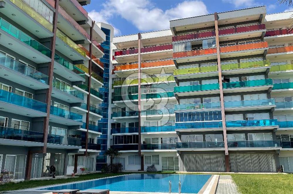 Bornova Park Evlerinde Havuz Cepheli Büyük Tip 1+1 Satılık Daire