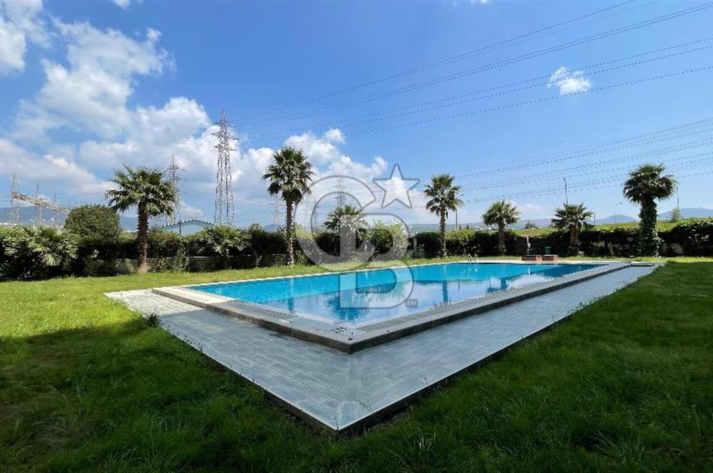 Bornova Park Evlerinde Havuz Cepheli Büyük Tip 1+1 Satılık Daire