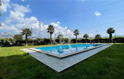 Bornova Park Evlerinde Havuz Cepheli Büyük Tip 1+1 Satılık Daire