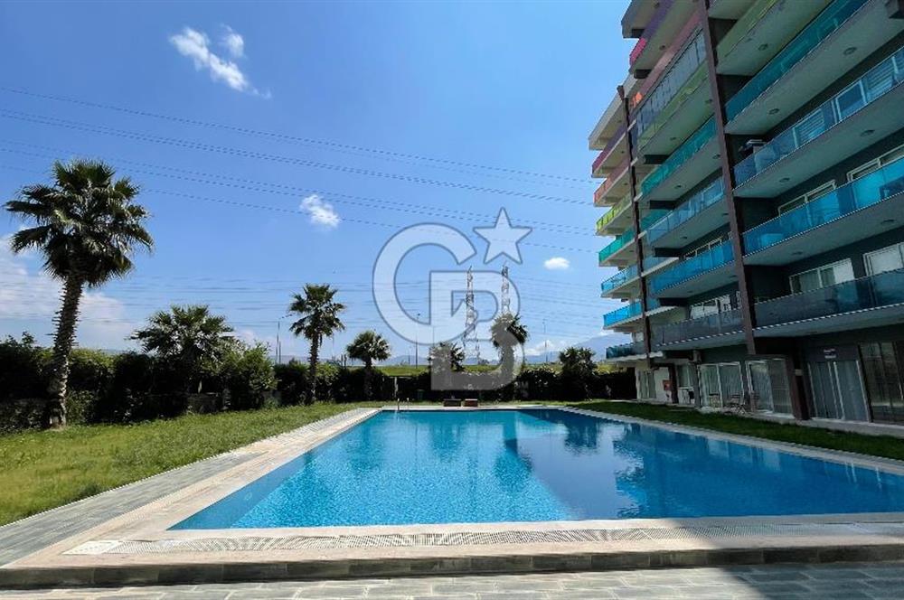 Bornova Park Evlerinde Havuz Cepheli Büyük Tip 1+1 Satılık Daire