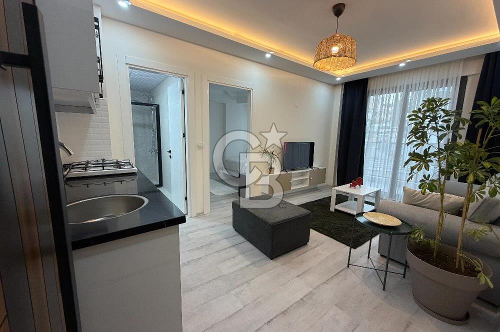 BUCA KURUÇEŞME’DE SATILIK 1+1 EŞYALI SIFIR ARA KAT DAİRE