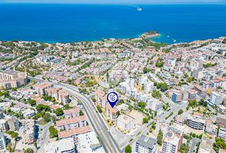 Kuşadası'nda Merkezi Konumda Ayrı Mutfaklı Satılık 1+1 Daire - 1 - 348886