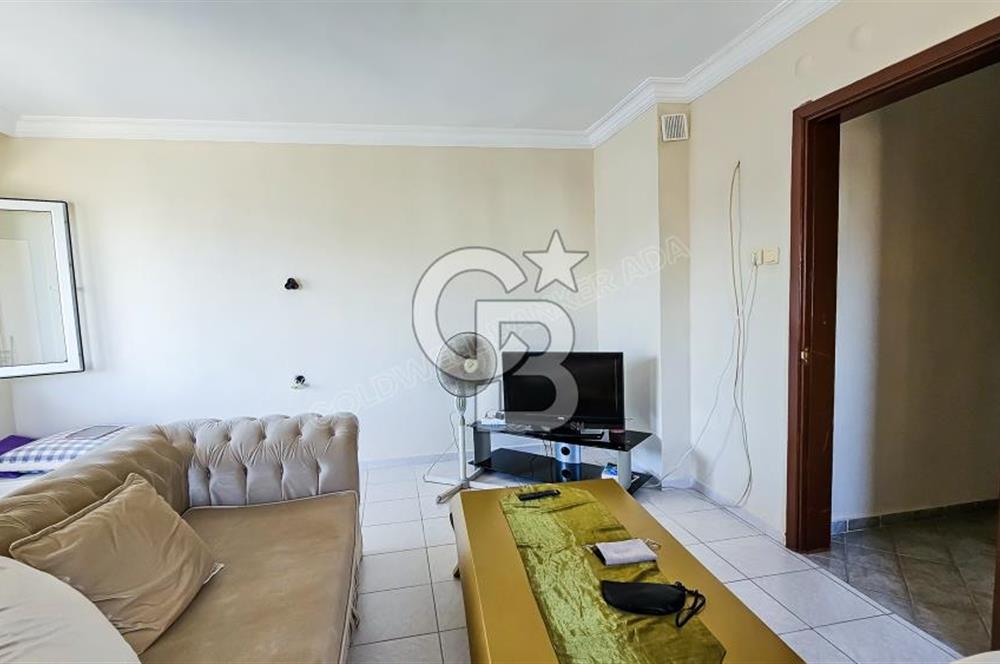 Kuşadası'nda Merkezi Konumda Ayrı Mutfaklı Satılık 1+1 Daire