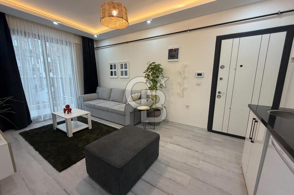 BUCA KURUÇEŞME’DE SATILIK 1+1 EŞYALI SIFIR ARA KAT DAİRE