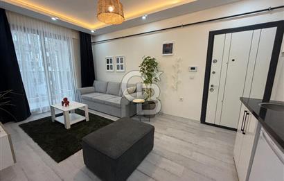 BUCA KURUÇEŞME’DE SATILIK 1+1 EŞYALI SIFIR ARA KAT DAİRE