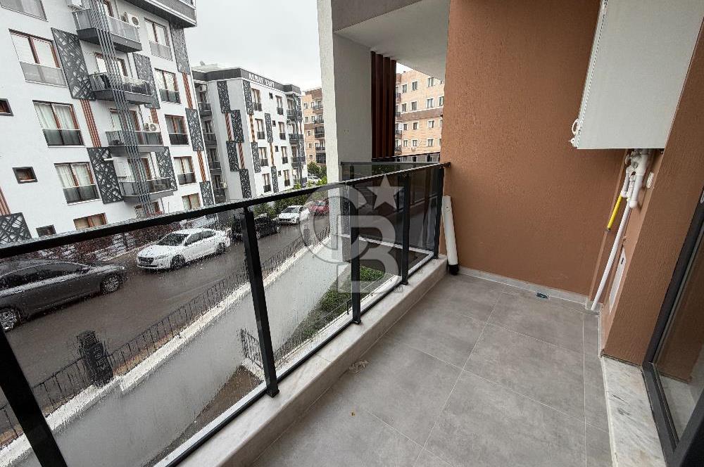 BUCA KURUÇEŞME’DE SATILIK 1+1 EŞYALI SIFIR ARA KAT DAİRE