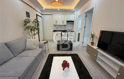 BUCA KURUÇEŞME’DE SATILIK 1+1 EŞYALI SIFIR ARA KAT DAİRE