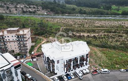 BUCA KURUÇEŞME’DE SATILIK 1+1 EŞYALI SIFIR ARA KAT DAİRE