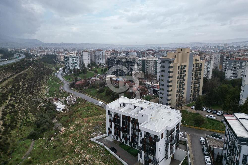 BUCA KURUÇEŞME’DE SATILIK 1+1 EŞYALI SIFIR ARA KAT DAİRE