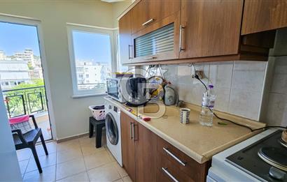 Kuşadası'nda Merkezi Konumda Ayrı Mutfaklı Satılık 1+1 Daire