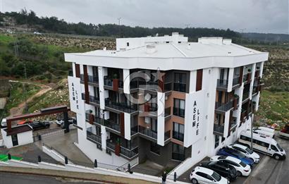 BUCA KURUÇEŞME’DE SATILIK 1+1 EŞYALI SIFIR ARA KAT DAİRE