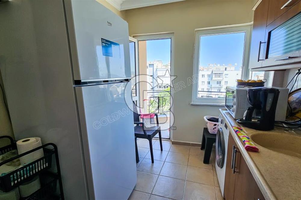 Kuşadası'nda Merkezi Konumda Ayrı Mutfaklı Satılık 1+1 Daire