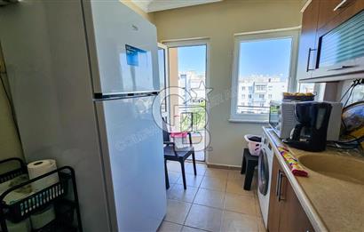 Kuşadası'nda Merkezi Konumda Ayrı Mutfaklı Satılık 1+1 Daire