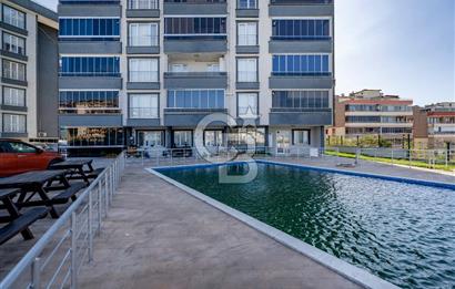 Güzelyalı Eğitim Mahallesinde Deniz Manzaralı Havuzlu Sitede 2+1