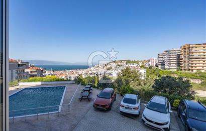 Güzelyalı Eğitim Mahallesinde Deniz Manzaralı Havuzlu Sitede 2+1