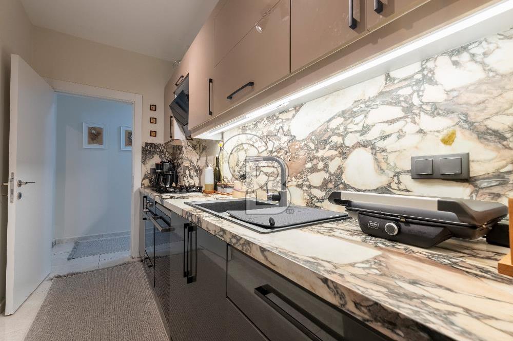 KARŞIYAKA BAHRİYE ÜÇOK'TA YENİ BİNADA ARAKAT SATILIK 2+1 DAİRE