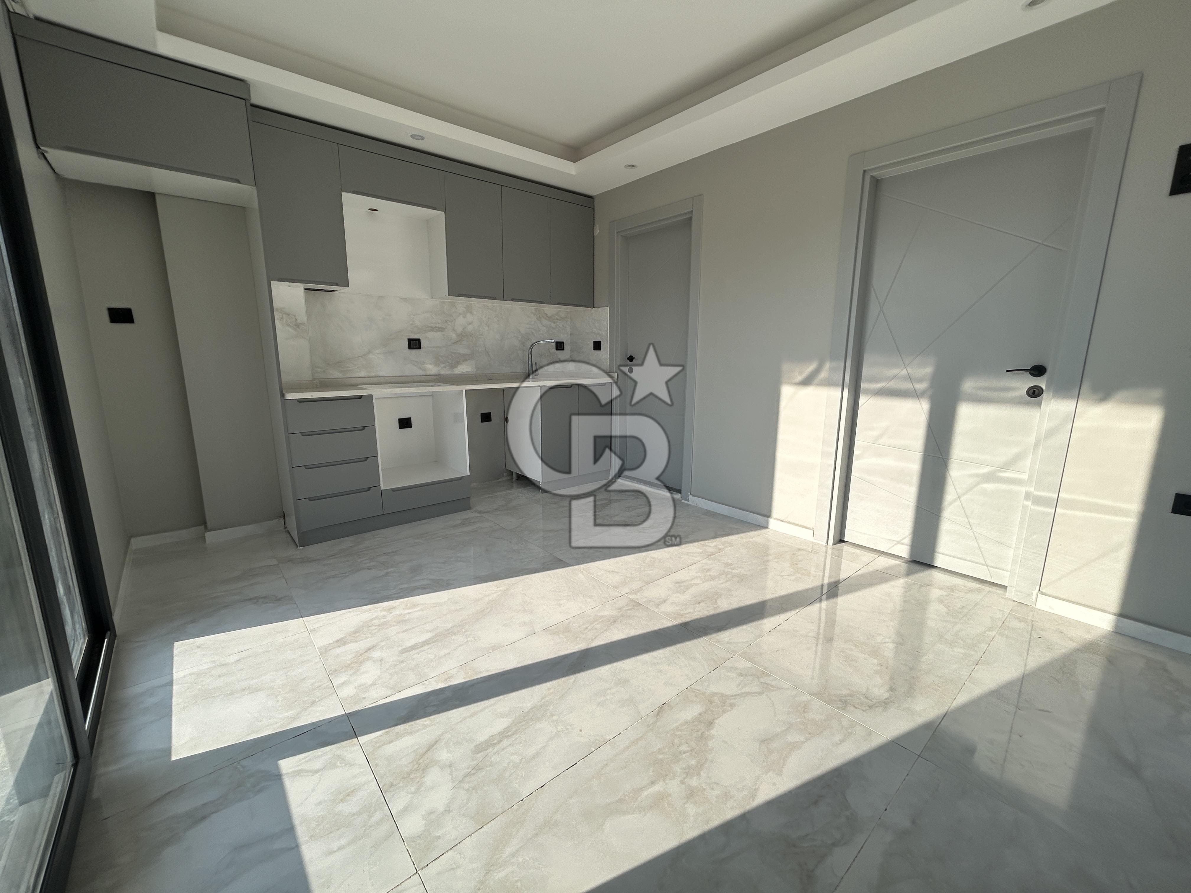 Karaburun Mordoğan'da Merkezi Konumda 1+1 Kiralık