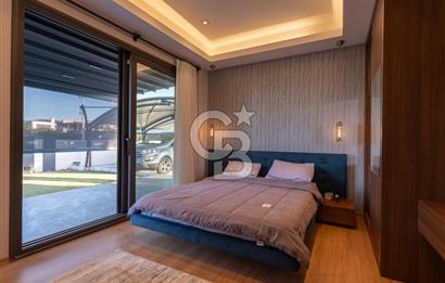 ÇEŞME DALYAN'DA HAVUZLU ÖZEL TASARIM SATILIK 5+2 VİLLA