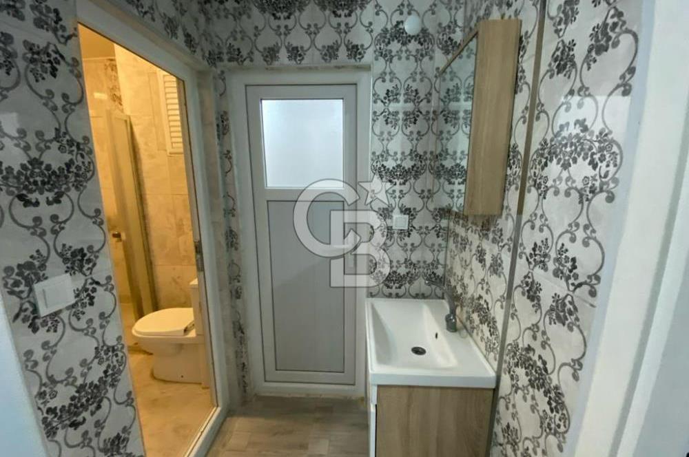 İZMİT ÇARŞI MERKEZ'DE ARA KAT 3+1 İÇİ YAPILI SATILIK DAİRE