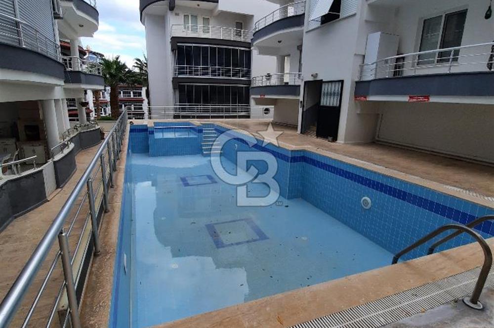 DİDİM ALTINKUM DENİZE YÜRÜME MESAFESİNDE HAVUZLU SİTEDE 2+1 DAİRE 