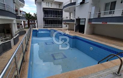 DİDİM ALTINKUM DENİZE YÜRÜME MESAFESİNDE HAVUZLU SİTEDE 2+1 DAİRE 