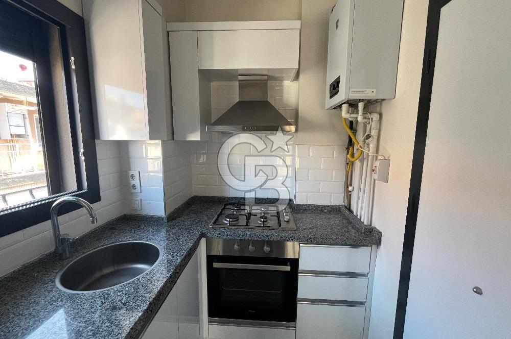 Karşıyaka Merkezde Yeni Binada Kiralık 1+1 Köşe Daire