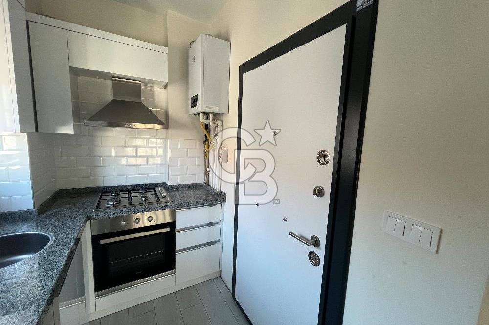 Karşıyaka Merkezde Yeni Binada Kiralık 1+1 Köşe Daire