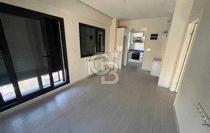 Karşıyaka Merkezde Yeni Binada Kiralık 1+1 Köşe Daire