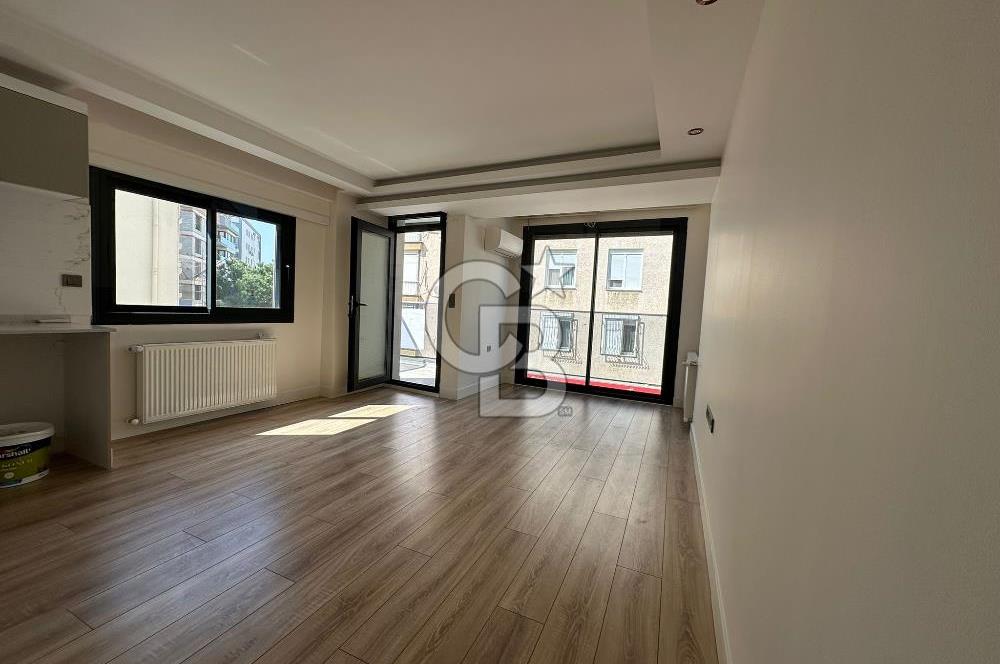 Karşıyaka Bostanlı'da Yeni Binada Bakımlı Kiralık Daire