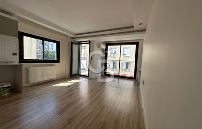 Karşıyaka Bostanlı'da Yeni Binada Bakımlı Kiralık Daire
