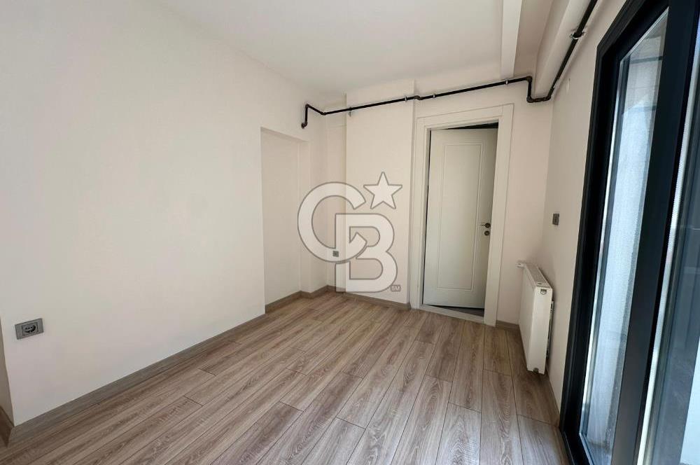 Karşıyaka Bostanlı'da Yeni Binada Bakımlı Kiralık Daire