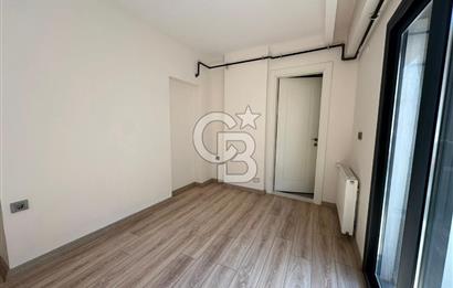 Karşıyaka Bostanlı'da Yeni Binada Bakımlı Kiralık Daire