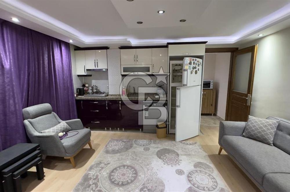 C.B.ROUTE | DİKİLİ MERKEZDE BAHÇE KATI FULL EŞYALI KİRALIK DAİRE