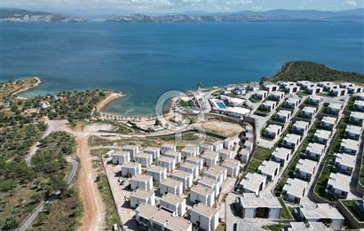KIYIKIŞLACIK İASOS TA ATASAYANLAR PLAJLI SİTEDE 2 ADET 1+1 DAİRE