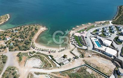 KIYIKIŞLACIK İASOS TA ATASAYANLAR PLAJLI SİTEDE 2 ADET 1+1 DAİRE