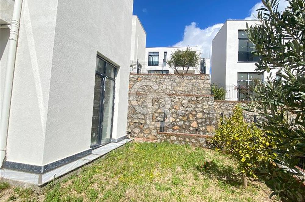 KIYIKIŞLACIK İASOS TA ATASAYANLAR PLAJLI SİTEDE 2 ADET 1+1 DAİRE